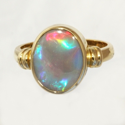 CUSTOM MADE 18k Yellow Gold Ring with a SOLID SEMI BLACK OPAL Large rolling flashes of bright red turning to peacock blue with a touch of green and purple